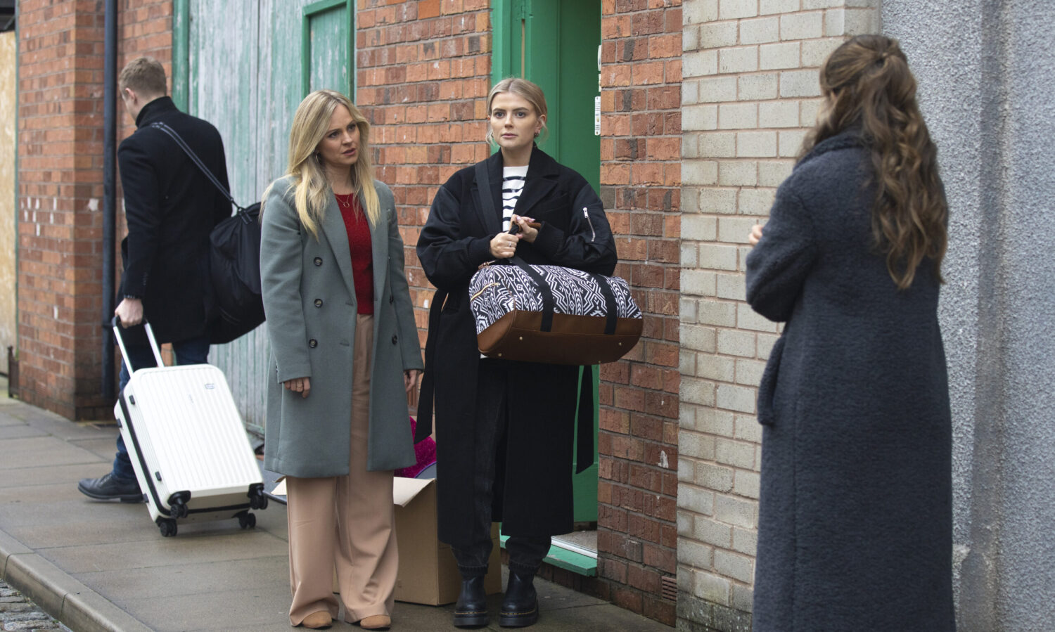 Coronation Street's Daniel, Sarah, Bethany and Daisy talking outside