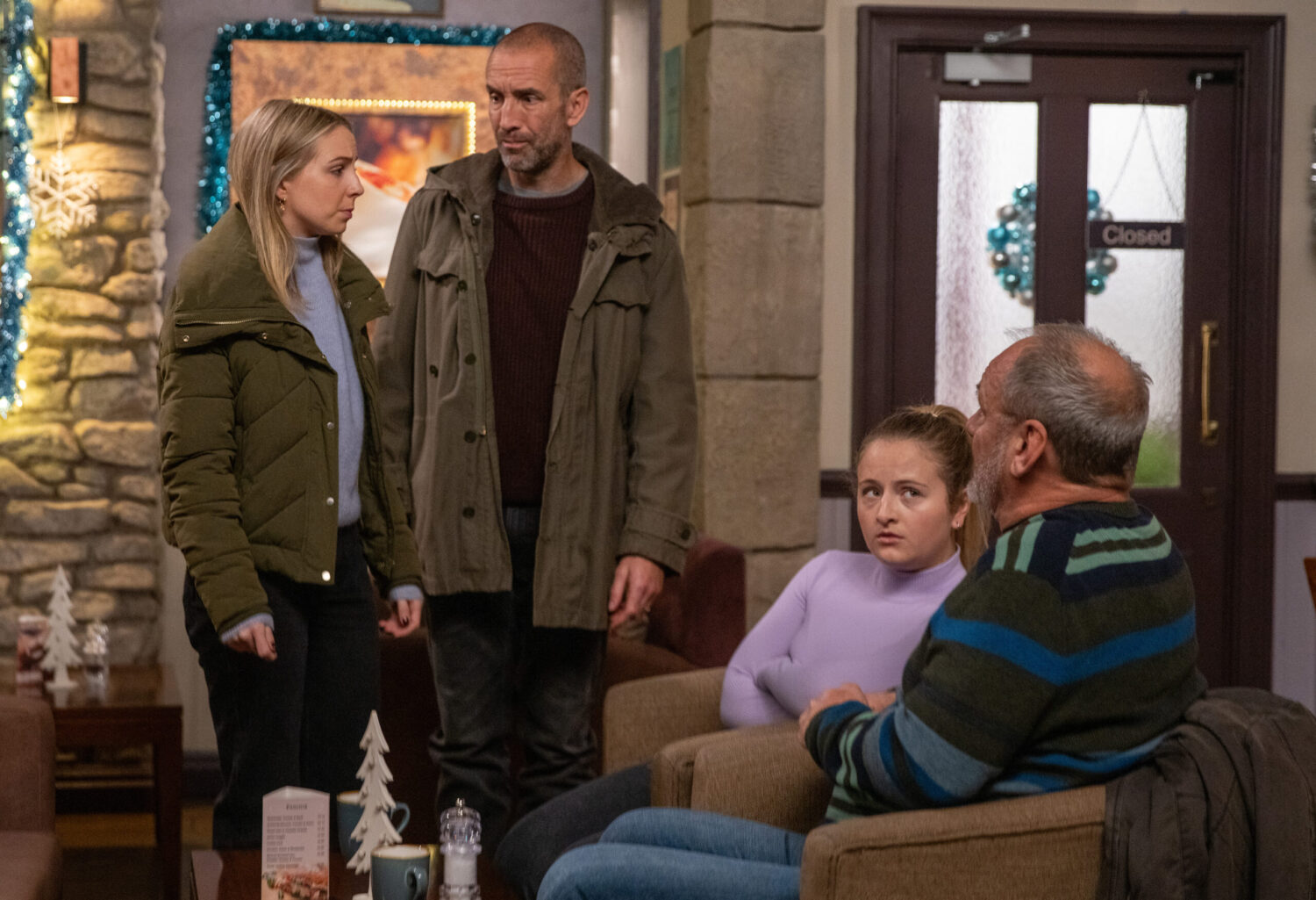 Belle, Sam, Amelia and Jimmy serious in the caf�