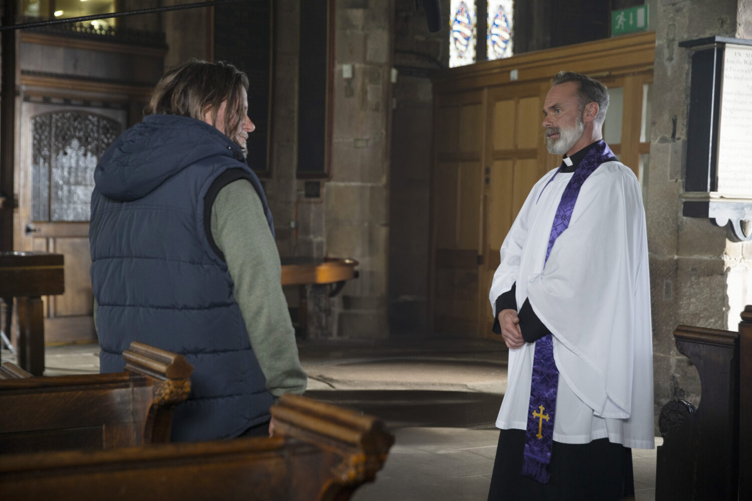 Billy talks to Denny at the church on Corrie
