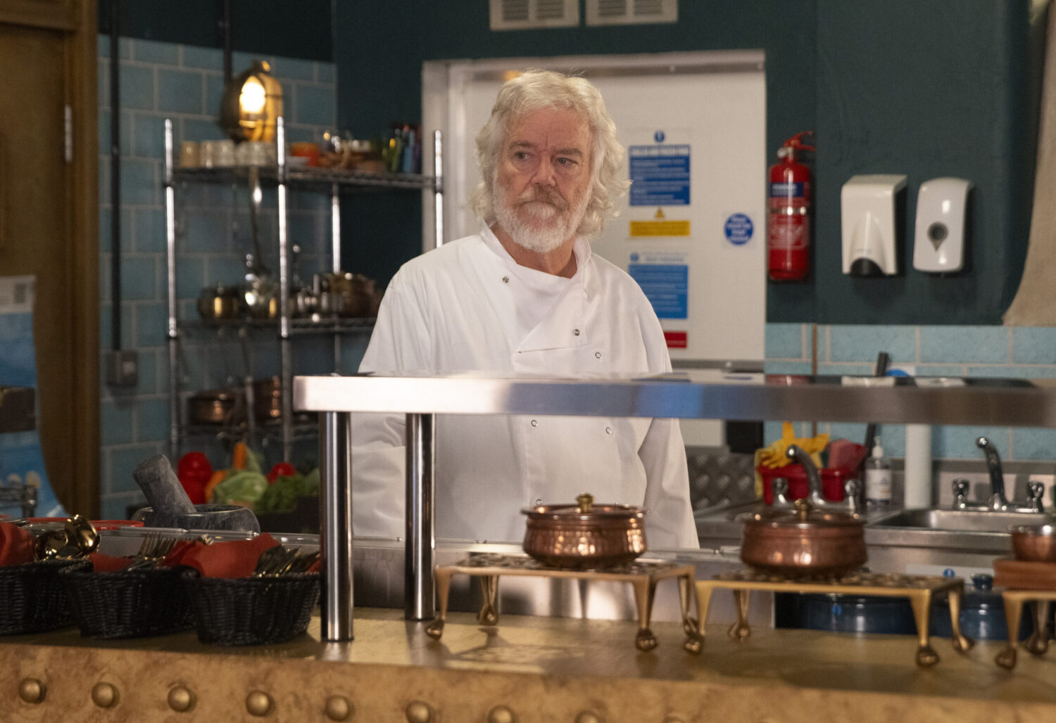 Corrie's Stu is looking sad at Speed Daal