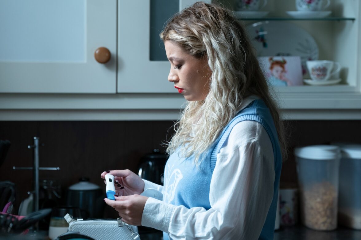 EastEnders Anna looks at her positive pregnancy test