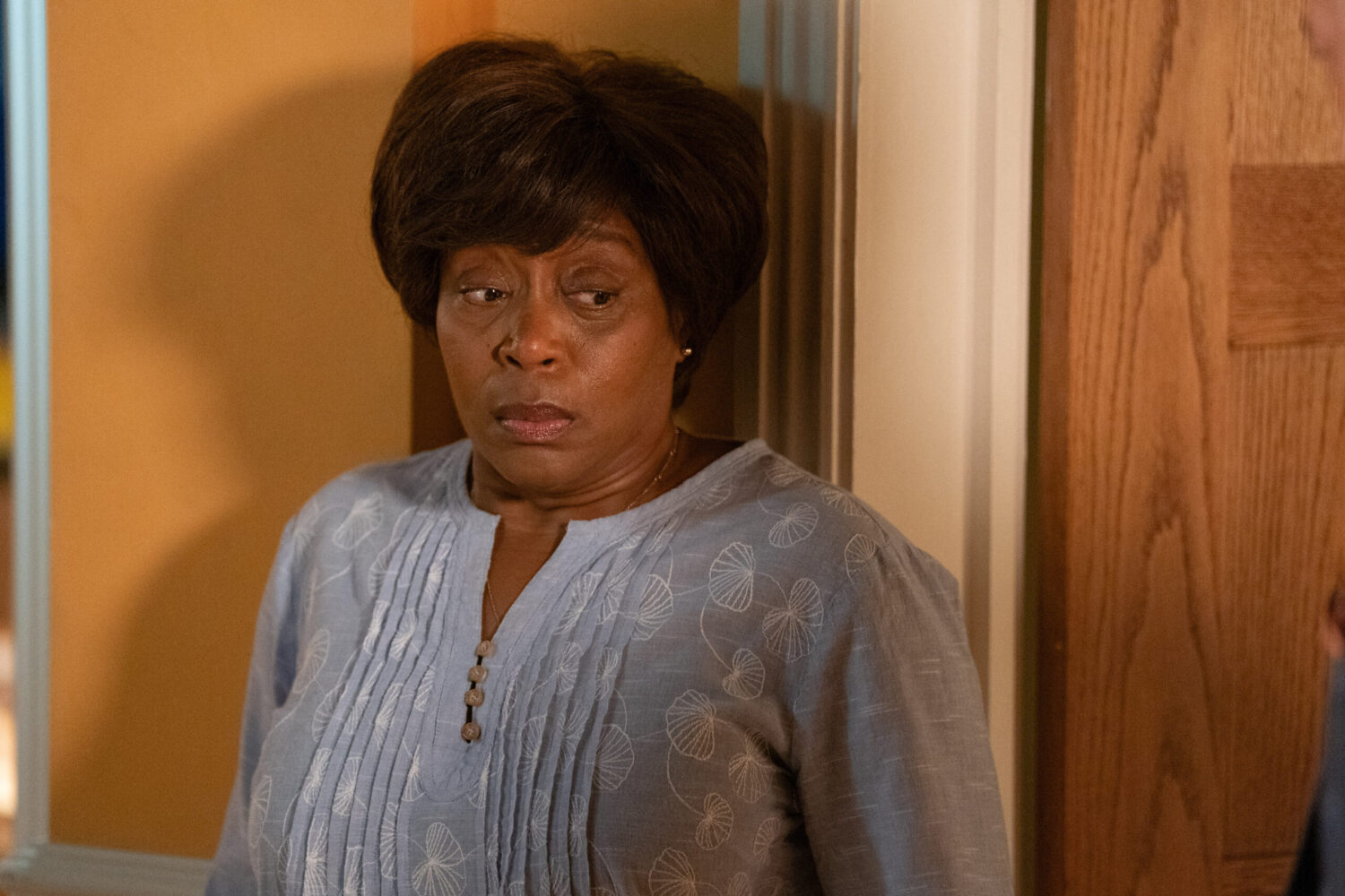 Yolande looks scared in EastEnders