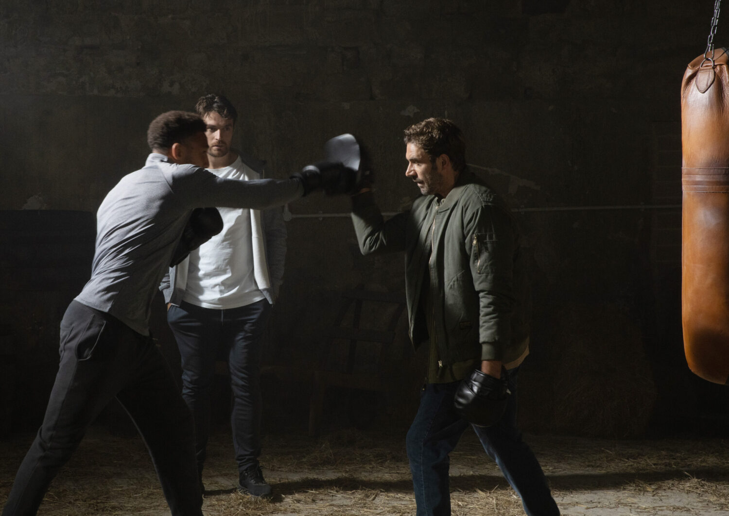 Billy and John boxing in front of Mack