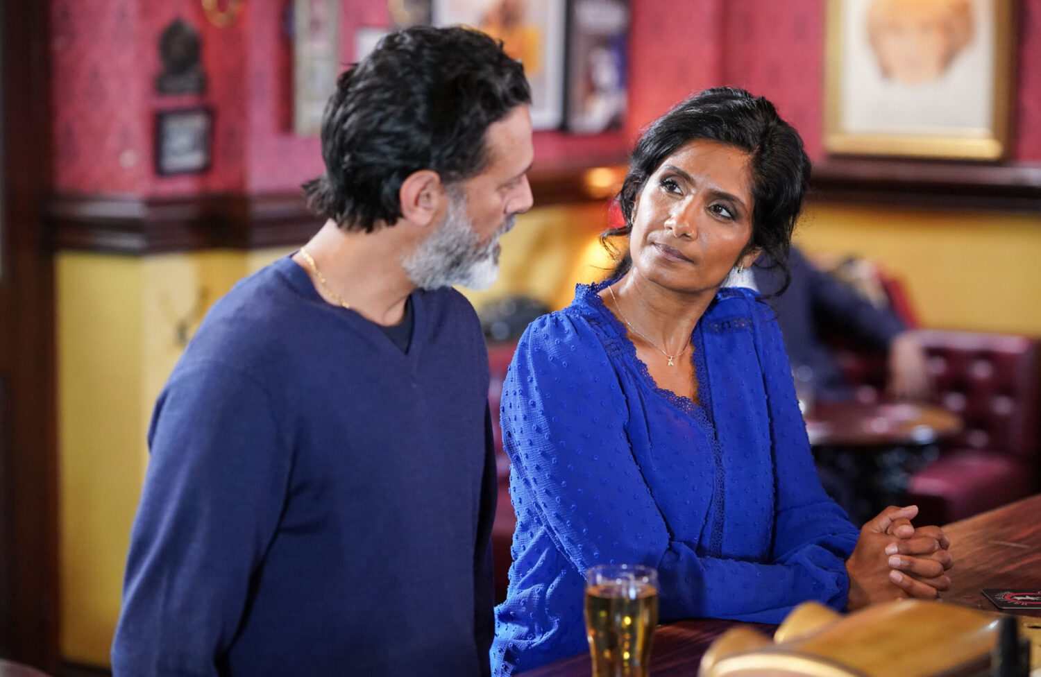 Nish and Suki talk seriously in the Vic in EastEnders