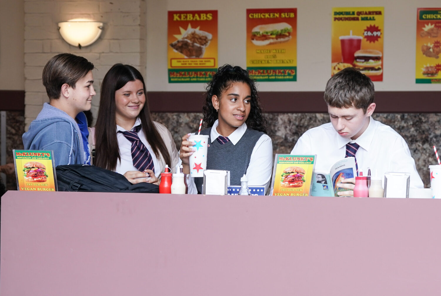 Amy, Lily, Avani and Harry in McKlunkys EastEnders