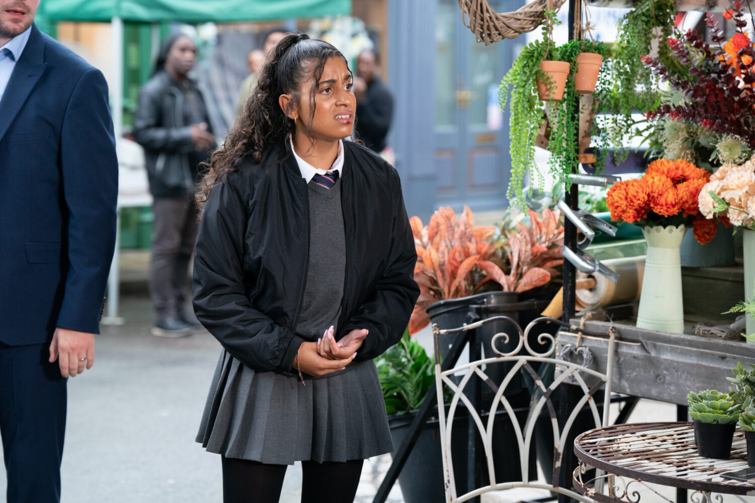 Avani looks nervous in EastEnders