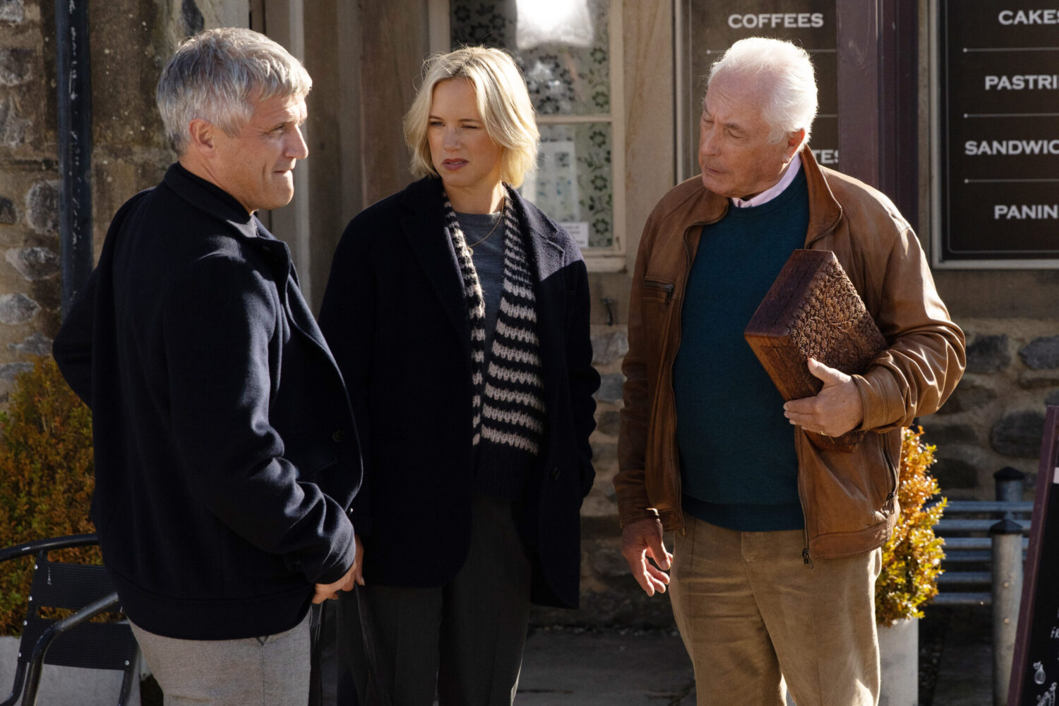 Caleb, Steph and Anthony are talking outside