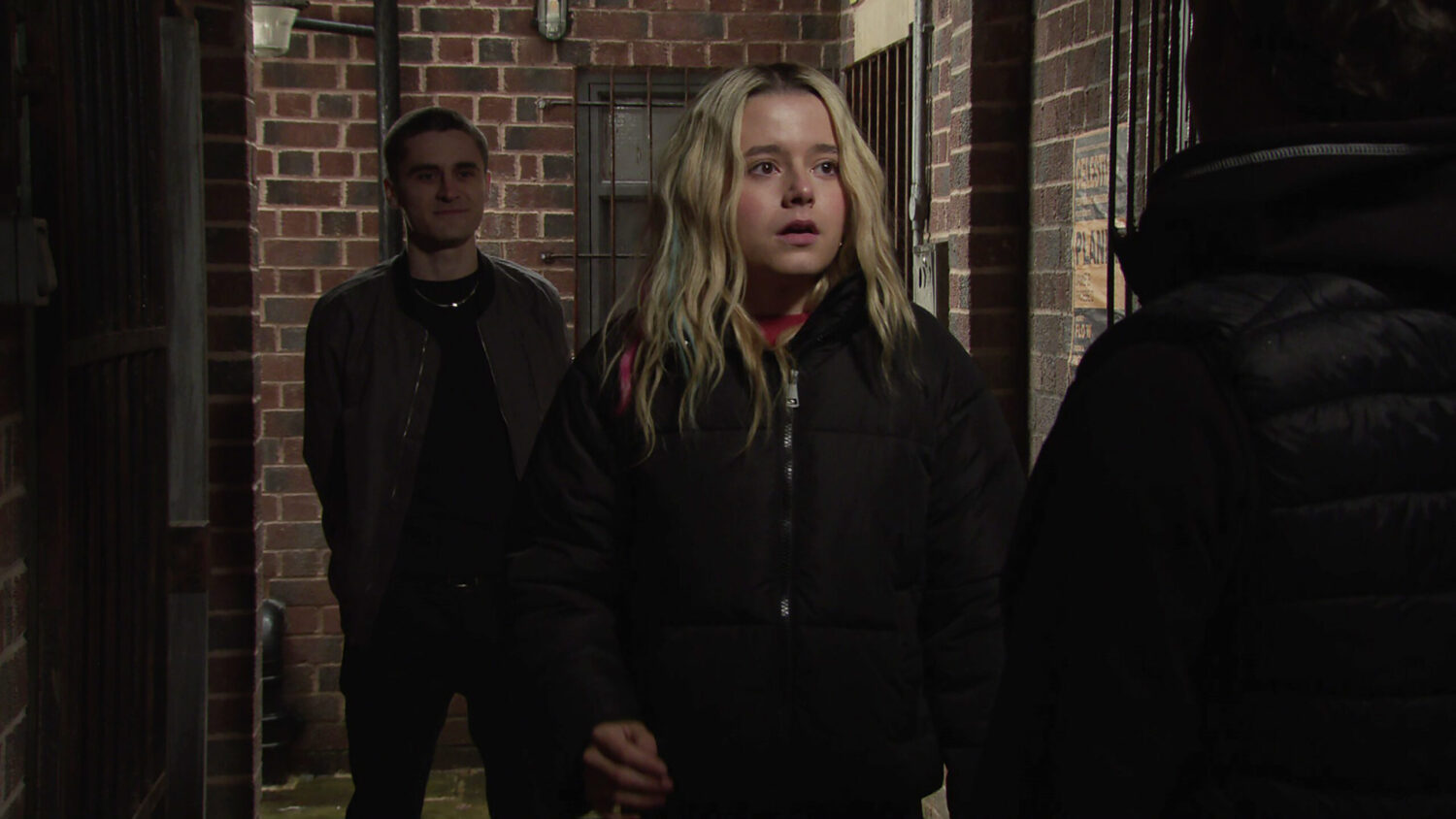 Coronation Street's Logan is standing behind a scared Betsy