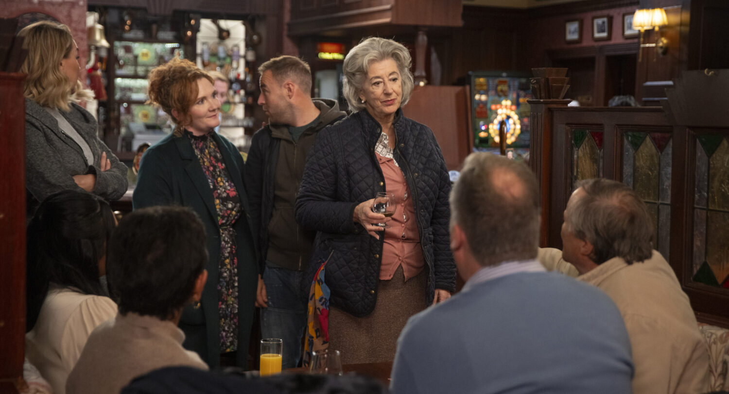 Evelyn drinking with her loved ones in the Rovers