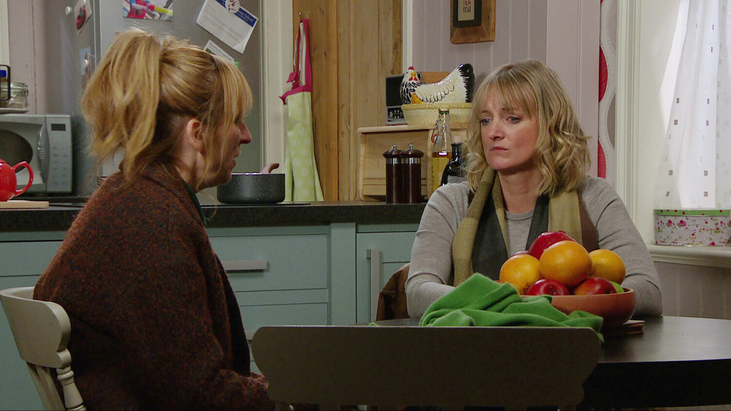 Emmerdale's Nicola, Laurel talking at table