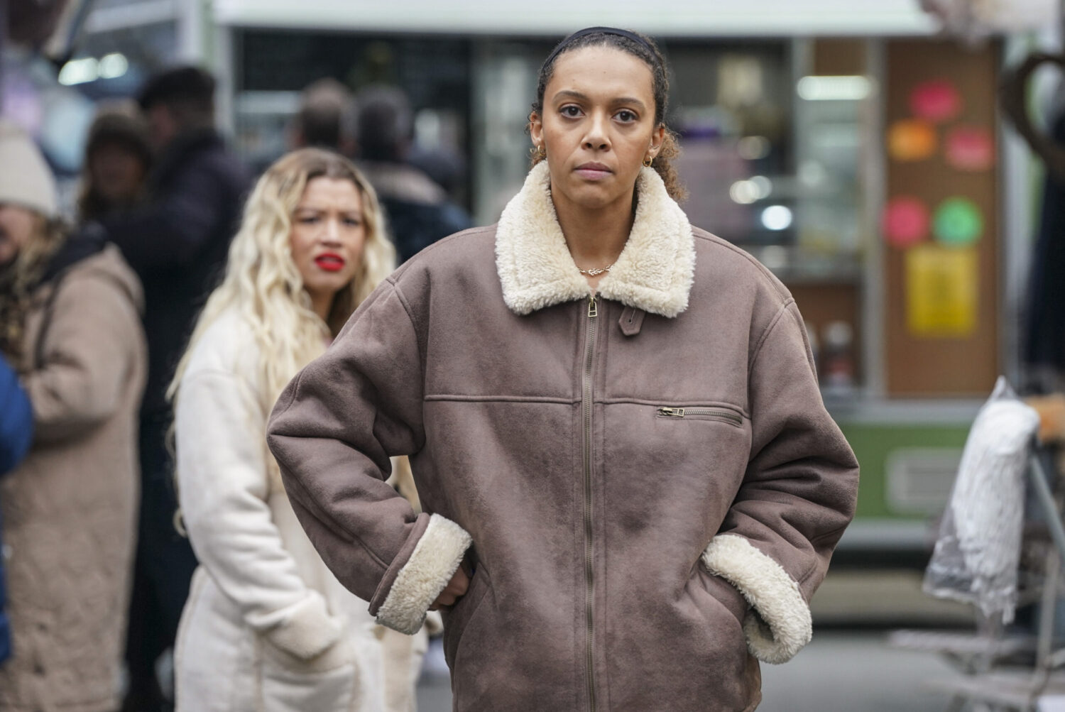 EastEnders' Gina with her back turned to Anna