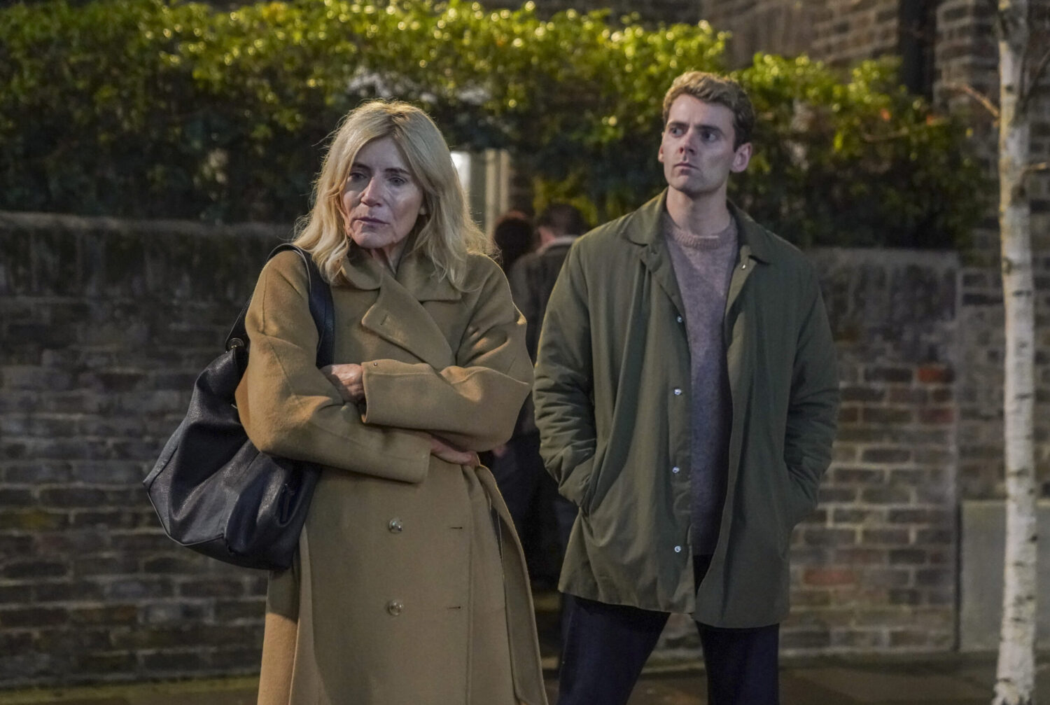 Peter looks suspiciously at his mum on EastEnders