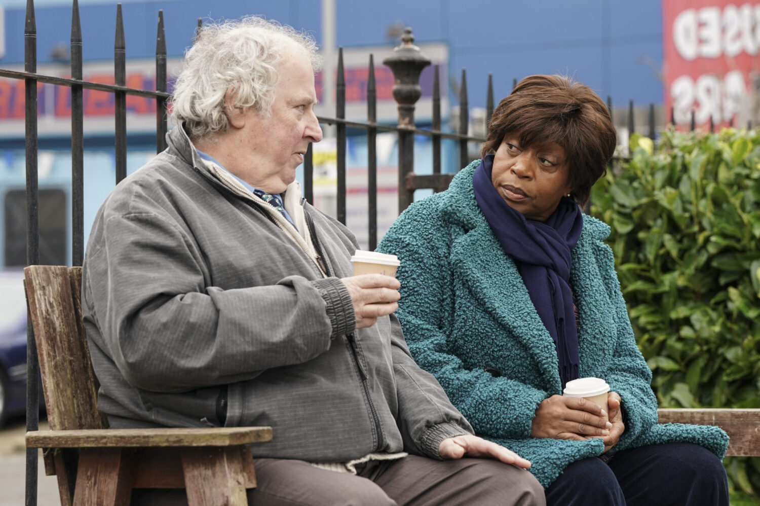 Nigel and Yolande sitting on a bench in EastEnders