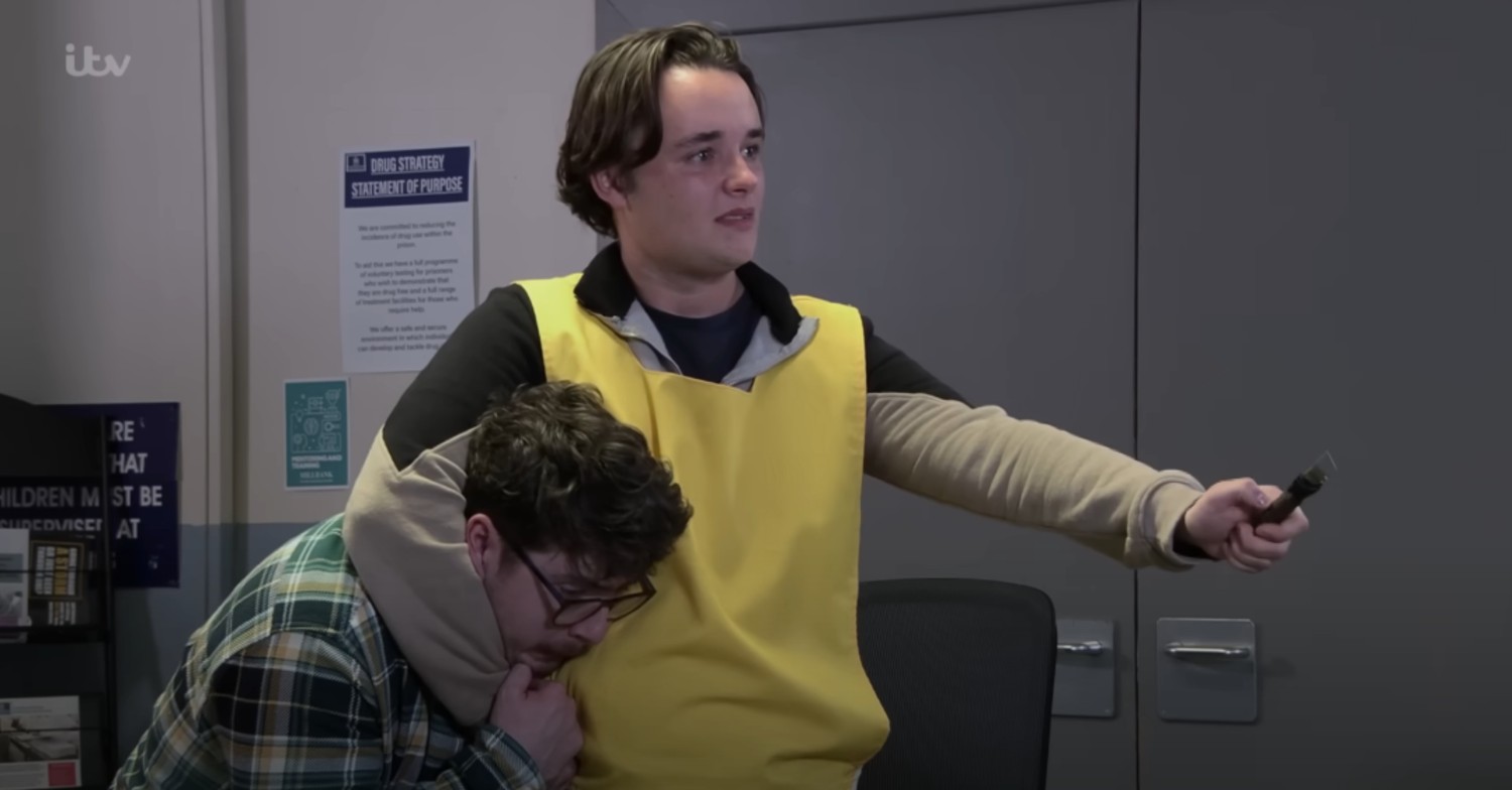 Matty holding Bobby hostage on Coronation Street