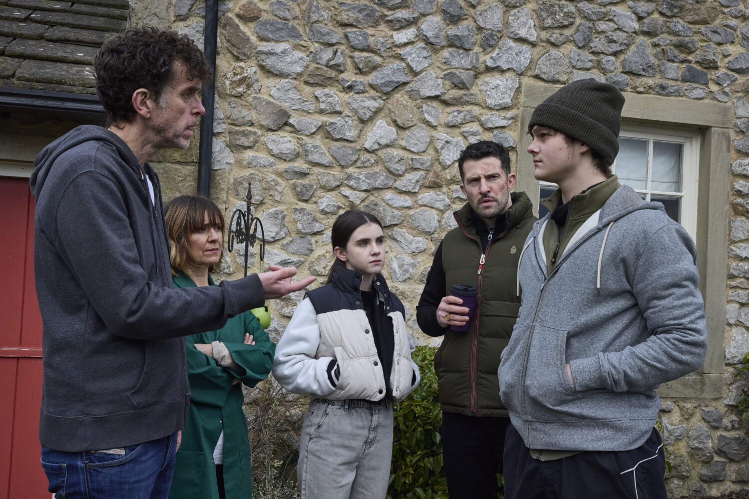 Marlon talking to Dylan outside