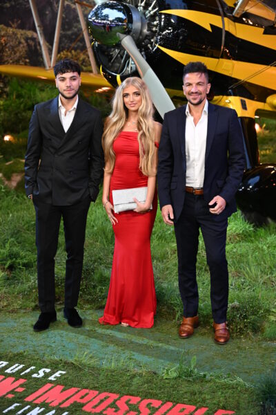 princess Andre with her brother and dad at event