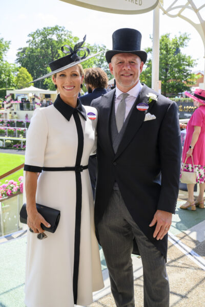 Mike and Zara Tindall smiling at the races